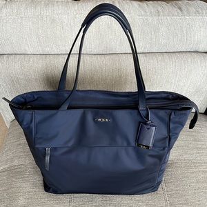 Used Tumi Navy Blue Voyageur M Tote Shoulder Bag.